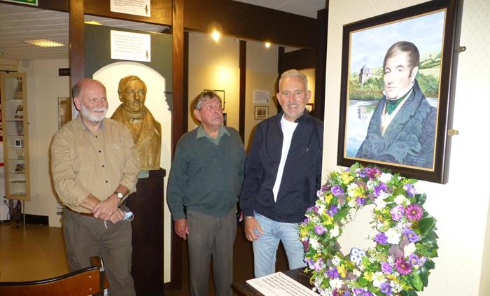 Brian Jones donates his portrait of Robert Owen to the museum. Present Colin Laker (curator), Rex Shayler (Chairman) and Brian Jones (local artist)